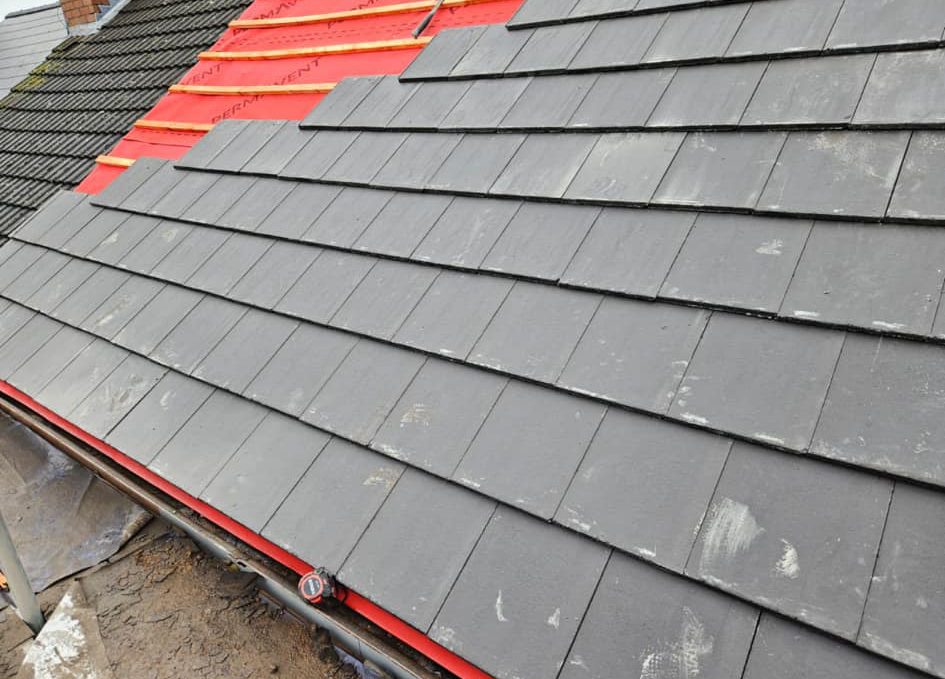 New roof tiling fixed over fresh underlay